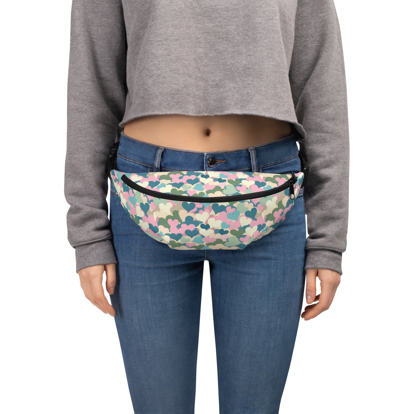 Kawaii Pastel hearts fanny pack around female models waist, front view