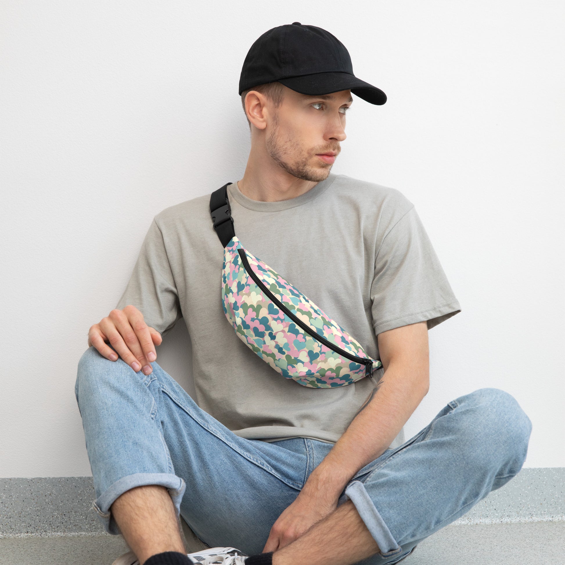 Kawaii Pastel hearts fanny pack on male model, front sling view